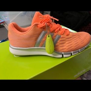 Coral adidas cloud foam sneakers